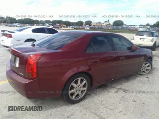 2003 Cadillac CTS with VIN 1G6DM57N230160649, listed as a IAAI auction lot 41696449 with 134,939 mi miles. Bid and sale history available at carsss.com. Image 4.