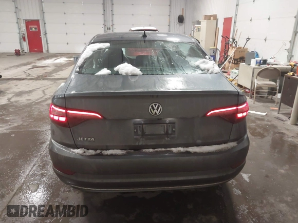2021 Volkswagen Jetta S z VIN 3VWC57BU6MM001399, wystawiony jako IAAI lot #41488758 z przebiegiem 44 442 mil mil oraz . Historia ofert i sprzedaży dostępna na DreamBid. Obrazek 16.