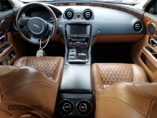 2016 Jaguar XJ Portfolio with VIN SAJWA2G71G8V95573, listed as a Copart auction lot 85975594 with 82,221 mi miles and Salvage title. Bid and sale history available at DreamBid. Image 8.