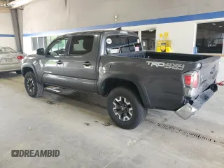 2021 Toyota Tacoma SR with VIN 3TMCZ5ANXMM425903, listed as a Copart auction lot 57963425 with 61,458 mi miles and Salvage title. Bid and sale history available at DreamBid. Image 2.