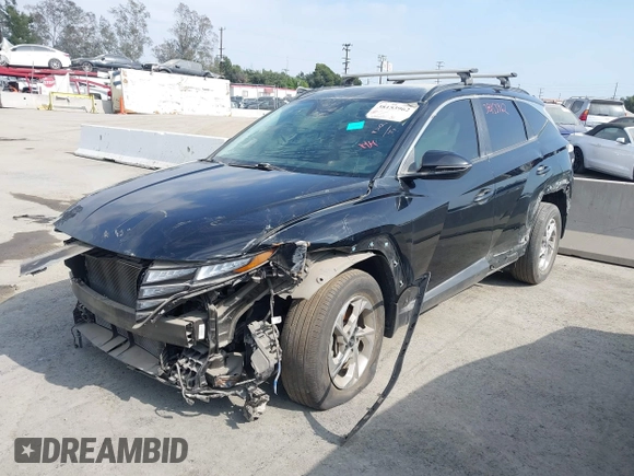 2022 Hyundai Tucson SEL with VIN 5NMJBCAEXNH037882, listed as a IAAI auction lot 38153962 with 35,302 mi miles. Bid and sale history available at carsss.com. Image 2.