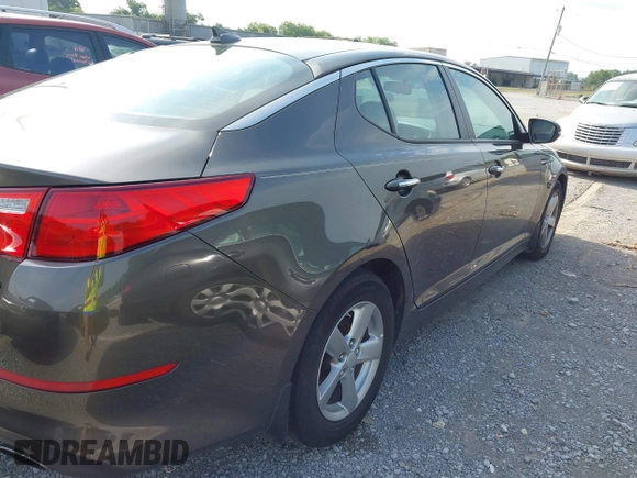 2015 Kia Optima LX with VIN 5XXGM4A77FG403664, listed as a IAAI auction lot 42471658 with 76,352 mi miles and . Bid and sale history available at DreamBid. Image 4.
