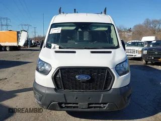 2021 Ford Transit Cargo with VIN 1FTBR1C80MKA48548, listed as a IAAI auction lot 41509103 with 87,523 mi miles and . Bid and sale history available at DreamBid. Image 12.