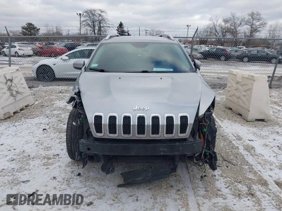 2016 Jeep Cherokee 75th Anniversary with VIN 1C4PJLCB1GW297555, listed as a IAAI auction lot 41232269 with 257,033 mi miles. Bid and sale history available at carsss.com. Image 12.