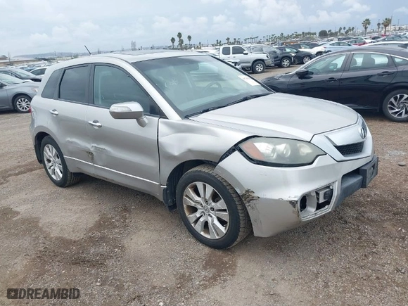 2010 Acura RDX with VIN 5J8TB2H26AA004687, listed as a IAAI auction lot 41765209 with 135,399 mi miles. Bid and sale history available at carsss.com. Image 1.