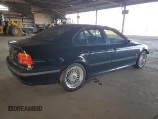 1999 BMW 5 Series 528iA with VIN WBADM6344XBY34517, listed as a Copart auction lot 51803145 with 186,637 mi miles and Salvage Title. Bid and sale history available at carsss.com. Image 3.