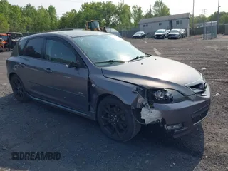 2007 Mazda 3 S Grand Touring z VIN JM1BK343771636816, wystawiony jako IAAI lot #42411432 z przebiegiem 157 082 mil mil oraz . Historia ofert i sprzedaży dostępna na DreamBid. Obrazek 1.