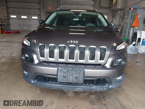 2017 Jeep Cherokee Latitude with VIN 1C4PJMCB6HW648564, listed as a IAAI auction lot 41987580 with 67,024 mi miles. Bid and sale history available at carsss.com. Image 6.