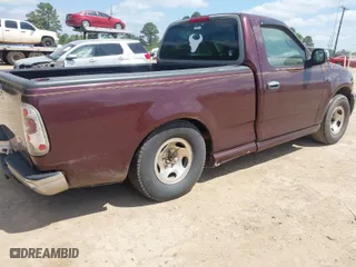 1998 Ford F-150 Standard with VIN 1FTZF1725WNB72765, listed as a IAAI auction lot 42056766 with 210,459 mi miles. Bid and sale history available at carsss.com. Image 4.