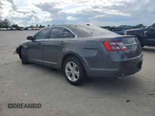 2018 Ford Taurus SEL with VIN 1FAHP2E8XJG137325, listed as a Copart auction lot 58850415 with 84,540 mi miles and Salvage title. Bid and sale history available at DreamBid. Image 2.