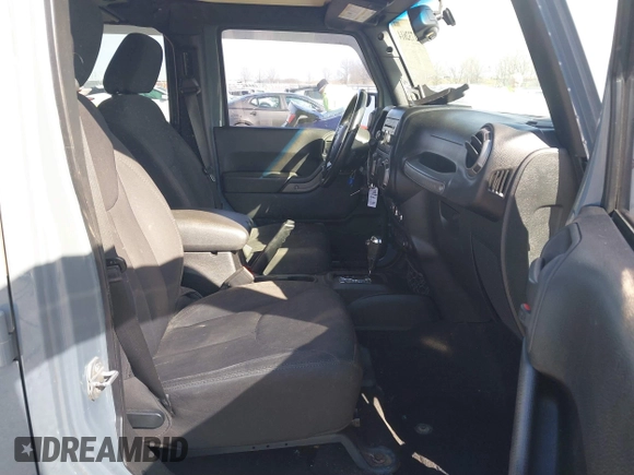 2015 Jeep Wrangler Unlimited Willys Wheeler with VIN 1C4BJWDG4FL589822, listed as a IAAI auction lot 41732614 with 149,112 mi miles and . Bid and sale history available at DreamBid. Image 5.