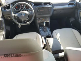 2020 Volkswagen Tiguan SE z VIN 3VV3B7AX8LM036808, wystawiony jako Copart lot #42124825 z przebiegiem 116 297 mil mil oraz Nie do naprawy. Historia ofert i sprzedaży dostępna na DreamBid. Obrazek 8.