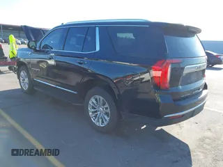 2021 GMC Yukon SLT with VIN 1GKS1BKD0MR199154, listed as a IAAI auction lot 41654239 with 105,357 mi miles. Bid and sale history available at carsss.com. Image 3.