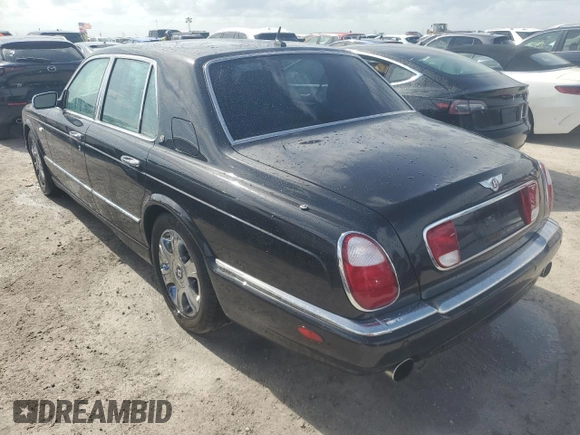 2006 Bentley Arnage R с VIN SCBLC37F26CX11385, выставлен на аукционе Copart как лот 76563524 с пробегом 23 197 миль миль и Списание • Salvage title. История ставок и продаж доступна на DreamBid. Изображение 2.