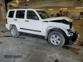2010 Jeep Liberty Sport with VIN 1J4PN2GK2AW115064, listed as a Copart auction lot 57344645 with 114,275 mi miles and Salvage title. Bid and sale history available at DreamBid. Image 4.