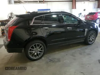 2016 Cadillac SRX Premium Collection с VIN 3GYFNDE35GS505972, выставлен на аукционе Copart как лот 79342004 с пробегом 166 238 миль миль и Чистый • Clean title. История ставок и продаж доступна на DreamBid. Изображение 3.