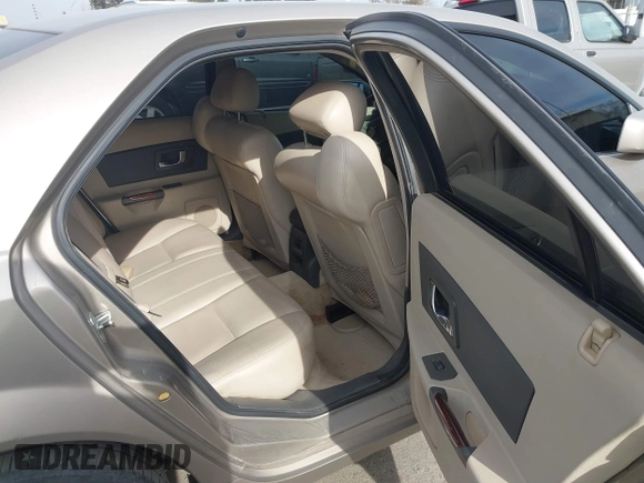 2003 Cadillac CTS with VIN 1G6DM57N730116792, listed as a IAAI auction lot 41686845 with 121,590 mi miles. Bid and sale history available at carsss.com. Image 8.