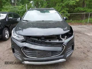 2021 Chevrolet Trax LT with VIN KL7CJLSB5MB322117, listed as a IAAI auction lot 42161568 with 63,344 mi miles and . Bid and sale history available at DreamBid. Image 12.
