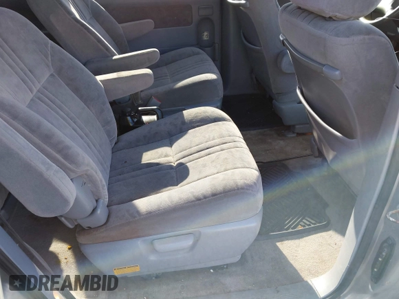 2002 Toyota Sienna LE with VIN 4T3ZF13C52U450825, listed as a IAAI auction lot 41604636 with 179,495 mi miles. Bid and sale history available at carsss.com. Image 8.