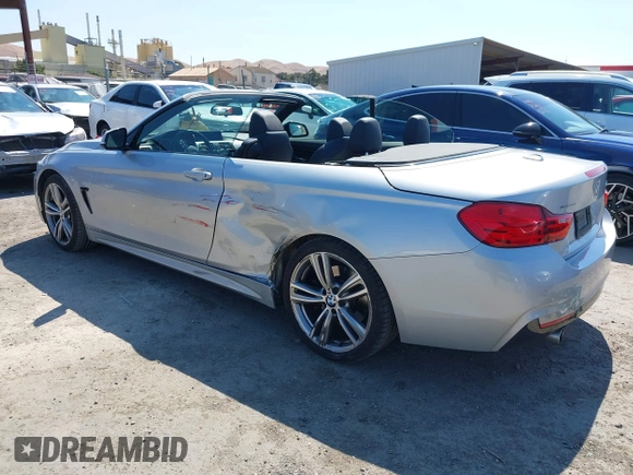 2014 BMW 4 Series 435i with VIN WBA3T3C54EJ877196, listed as a IAAI auction lot 42755387 with 113,172 mi miles and . Bid and sale history available at DreamBid. Image 3.