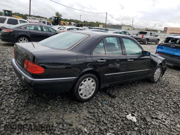 1999 Mercedes-Benz E-Class with VIN WDBJF65H4XA883351, listed as a Copart auction lot 73682964 with 156,446 mi miles and Salvage Title. Bid and sale history available at carsss.com. Image 3.