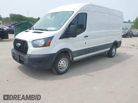 2024 Ford Transit Cargo with VIN 1FTBR2C82RKA72122, listed as a IAAI auction lot 42432209 with 26,806 mi miles and . Bid and sale history available at DreamBid. Image 17.