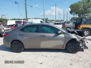 2019 Toyota Corolla L with VIN 5YFBURHE7KP878972, listed as a IAAI auction lot 42000888 with 201,612 mi miles. Bid and sale history available at carsss.com. Image 13.