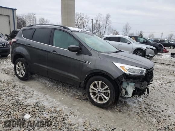 2017 Ford Escape SE with VIN 1FMCU9GD2HUB01278, listed as a Copart auction lot 83115634 with 112,753 mi miles and Clean Title. Bid and sale history available at carsss.com. Image 4.