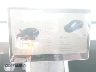 2024 Tesla Model Y Long Range z VIN 7SAYGDEE3RF121102, wystawiony jako Copart lot #60548895 z przebiegiem 13 336 mil mil oraz Szkoda całkowita • Salvage title. Historia ofert i sprzedaży dostępna na DreamBid. Obrazek 9.