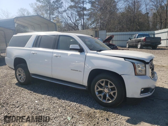 2015 GMC Yukon XL SLT with VIN 1GKS1HKC2FR118409, listed as a Copart auction lot 49601445 with 115,970 mi miles and Salvage Title. Bid and sale history available at carsss.com. Image 4.