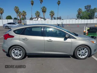2015 Ford Focus SE with VIN 1FADP3K21FL222119, listed as a IAAI auction lot 42146787 with 148,091 mi miles and . Bid and sale history available at DreamBid. Image 13.