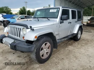 2012 Jeep Wrangler Unlimited Sahara with VIN 1C4BJWEG2CL142562, listed as a Copart auction lot 61178415 with 186,870 mi miles and Salvage title. Bid and sale history available at DreamBid. Image 1.