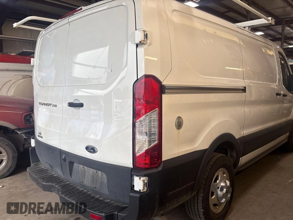 2021 Ford Transit Cargo with VIN 1FTBR2YG2MKA51800, listed as a IAAI auction lot 42793917 with 61,733 mi miles and . Bid and sale history available at DreamBid. Image 34.
