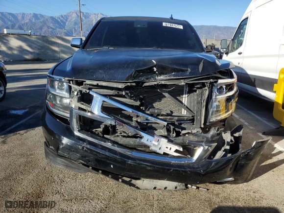 2017 Chevrolet Suburban Premier with VIN 1GNSCJKC3HR126011, listed as a Copart auction lot 87095354 with 122,437 mi miles and Clean Title. Bid and sale history available at carsss.com. Image 5.