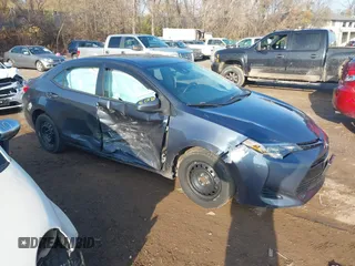 2018 Toyota Corolla L z VIN 2T1BURHE5JC985081, wystawiony jako IAAI lot #40876298 z przebiegiem 117 205 mil mil oraz . Historia ofert i sprzedaży dostępna na DreamBid. Obrazek 1.