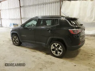 2018 Jeep Compass Limited with VIN 3C4NJDCBXJT399754, listed as a Copart auction lot 52698695 with 99,960 mi miles and Clean Title. Bid and sale history available at DreamBid. Image 2.