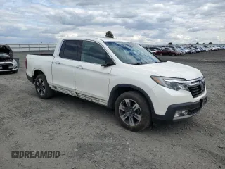 2019 Honda Ridgeline RTL-E with VIN 5FPYK3F74KB039057, listed as a Copart auction lot 57350525 with 105,102 mi miles and Salvage title. Bid and sale history available at DreamBid. Image 4.