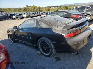 1995 Mitsubishi 3000GT GT z VIN JA3AM84J4SY001469, wystawiony jako Copart lot #75180794 z przebiegiem 198 490 mil mil oraz Szkody całkowita. Historia ofert i sprzedaży dostępna na DreamBid. Obrazek 2.