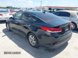2016 Kia Optima LX with VIN 5XXGT4L34GG084495, listed as a IAAI auction lot 42633502 with 148,038 mi miles and . Bid and sale history available at DreamBid. Image 3.