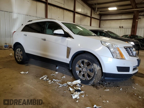 2015 Cadillac SRX Luxury Collection z VIN 3GYFNEE33FS641781, wystawiony jako Copart lot #50765905 z przebiegiem Nie podano mil oraz Szkody całkowita. Historia ofert i sprzedaży dostępna na DreamBid. Obrazek 4.