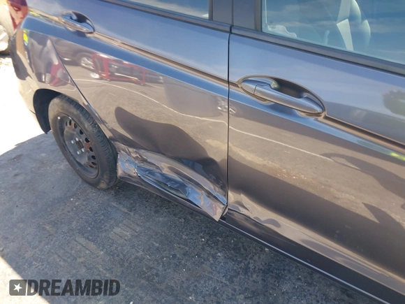 2020 Honda Fit LX with VIN 3HGGK5H40LM707356, listed as a IAAI auction lot 42076367 with 10,145 mi miles and . Bid and sale history available at DreamBid. Image 6.