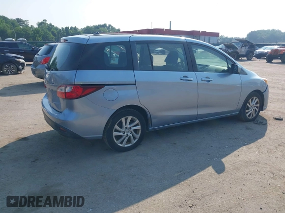 2012 Mazda 5 Sport with VIN JM1CW2BL5C0109542, listed as a IAAI auction lot 42494218 with 248,428 mi miles and . Bid and sale history available at DreamBid. Image 4.