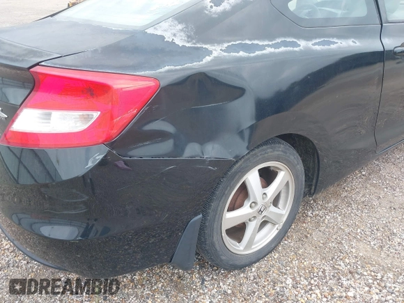 2012 Honda Civic Cpe LX with VIN 2HGFG3B59CH565932, listed as a IAAI auction lot 41949011 with 213,786 mi miles. Bid and sale history available at carsss.com. Image 18.