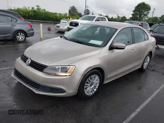 2012 Volkswagen Jetta SE z VIN 3VWDP7AJ5CM461691, wystawiony jako IAAI lot #42237130 z przebiegiem 102 664 mil mil oraz . Historia ofert i sprzedaży dostępna na DreamBid. Obrazek 2.
