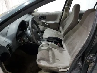 1998 Saturn SL z VIN 1G8ZH5280WZ312544, wystawiony jako Copart lot #50971665 z przebiegiem 119 855 mil mil oraz Szkoda całkowita • Salvage title. Historia ofert i sprzedaży dostępna na DreamBid. Obrazek 7.