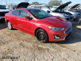 2020 Ford Fusion Plug-In Hybrid Titanium with VIN 3FA6P0SU4LR171351, listed as a Copart auction lot 74974754 with 0 mi miles and Salvage Title. Bid and sale history available at carsss.com. Image 4.