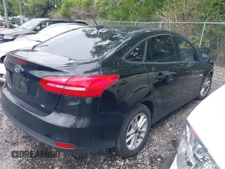 2018 Ford Focus SE with VIN 1FADP3F24JL248653, listed as a IAAI auction lot 42416377 with 113,856 mi miles and . Bid and sale history available at DreamBid. Image 4.