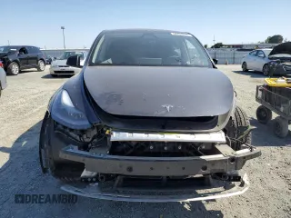 2024 Tesla Model Y Long Range z VIN 7SAYGAEE0RF101971, wystawiony jako Copart lot #58794335 z przebiegiem 16 099 mil mil oraz Szkoda całkowita • Salvage title. Historia ofert i sprzedaży dostępna na DreamBid. Obrazek 5.