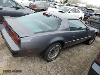 1986 Pontiac Firebird with VIN 1G2FS87S2GL247754, listed as a Copart auction lot 49340634 with 52,081 mi miles and Salvage Title. Bid and sale history available at carsss.com. Image 3.