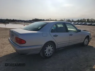 1999 Mercedes-Benz E-Class with VIN WDBJF65H9XA903481, listed as a Copart auction lot 79516914 with 201,080 mi miles and Salvage Title. Bid and sale history available at carsss.com. Image 3.
